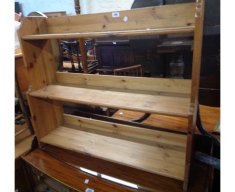 A 93cm modern pine three shelf waterfall open bookcase