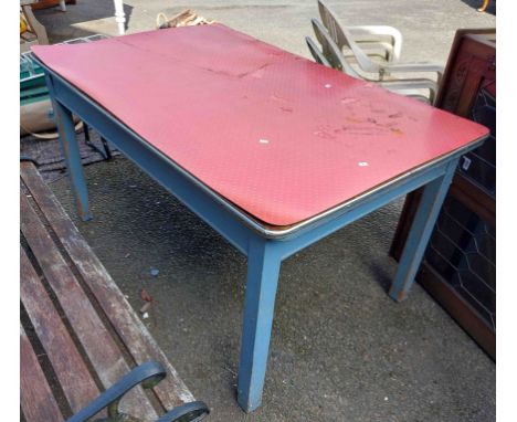 A vintage pine table with red formica top set on blue painted base