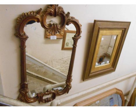 A vintage gilt framed and slipped oblong wall mirror - sold with a decorative gilt resin framed similar
