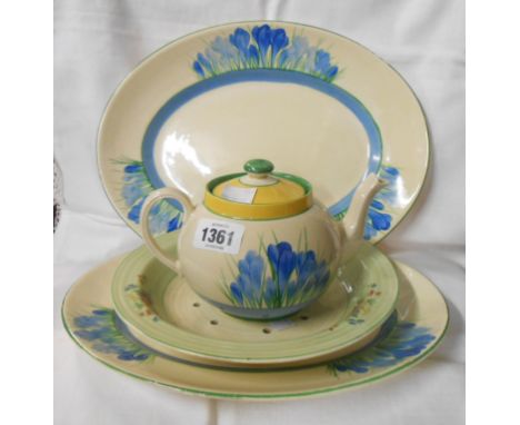 A Clarice Cliff Bizarre teapot with blue crocus design - sold with two similar graduated meat plates and a transfer printed s