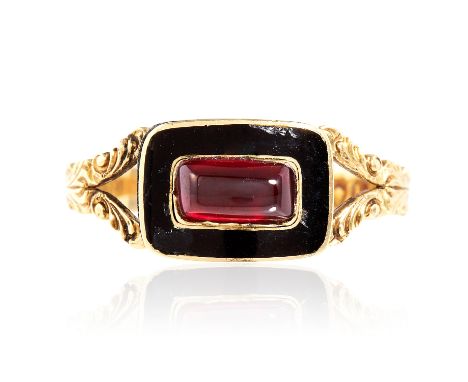 AN ANTIQUE GEORGIAN GARNET AND ENAMEL MOURNING RING, 1823 in 18ct yellow gold, the rectangular cabochon garnet encircled with