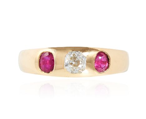 AN ANTIQUE DIAMOND AND RUBY GYPSY RING in 18ct yellow gold, the tapering band rubover set with an old cut diamond between ova