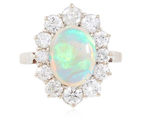 AN OPAL AND DIAMOND CLUSTER RING in white gold or platinum, set with a cabochon opal of approximately 2.28 carats in a cluste