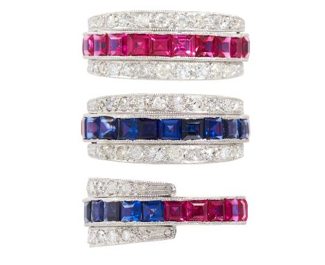 A SAPPHIRE, RUBY AND DIAMOND REVERSIBLE RING in platinum or white gold, the central band half set each with rubies and sapphi