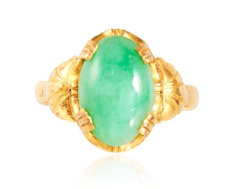 A JADEITE JADE DRESS RING in high carat yellow gold, set with an oval jade cabochon between stylised shoulders, marked indist