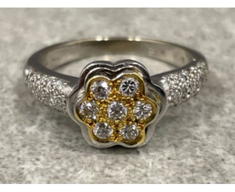 Ladies 18ct white gold Diamond cluster ring. Size N 5.27g