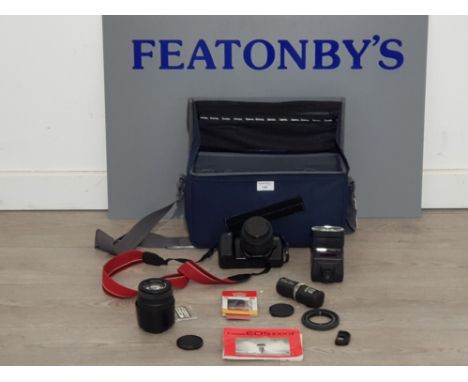A cannon eos 1000 camera comes with original carry bag and accessories includes spare lense