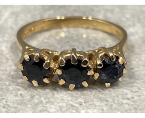 Ladies 9ct gold Sapphire ring. Featuring 3 round blue sapphires. 2.2g size L