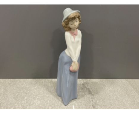 Nao by Lladro. Girl in hat with bag