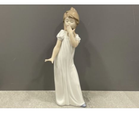 Nao by Lladro. Girl yawning. In good condition