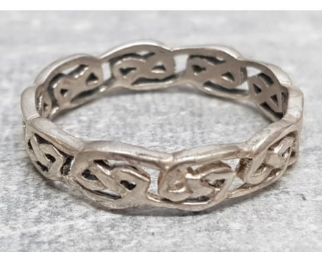 Silver celtic design band ring, 3.4g size Y