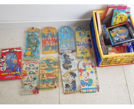 Crate containing a large Quantity of vintage novelty pinball games, includes Paddington bear, Tom and Jerry, Disney Mickey an