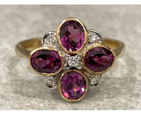 Ladies 9ct gold Rhodilite Garnet and Diamond ring. 2.81g size O