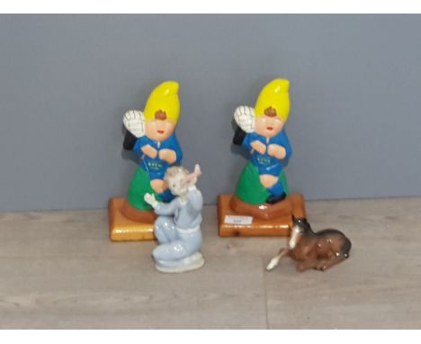 Four figurines two of them gnome figures mounted on wood a nao boy figure along with a small beswick horse