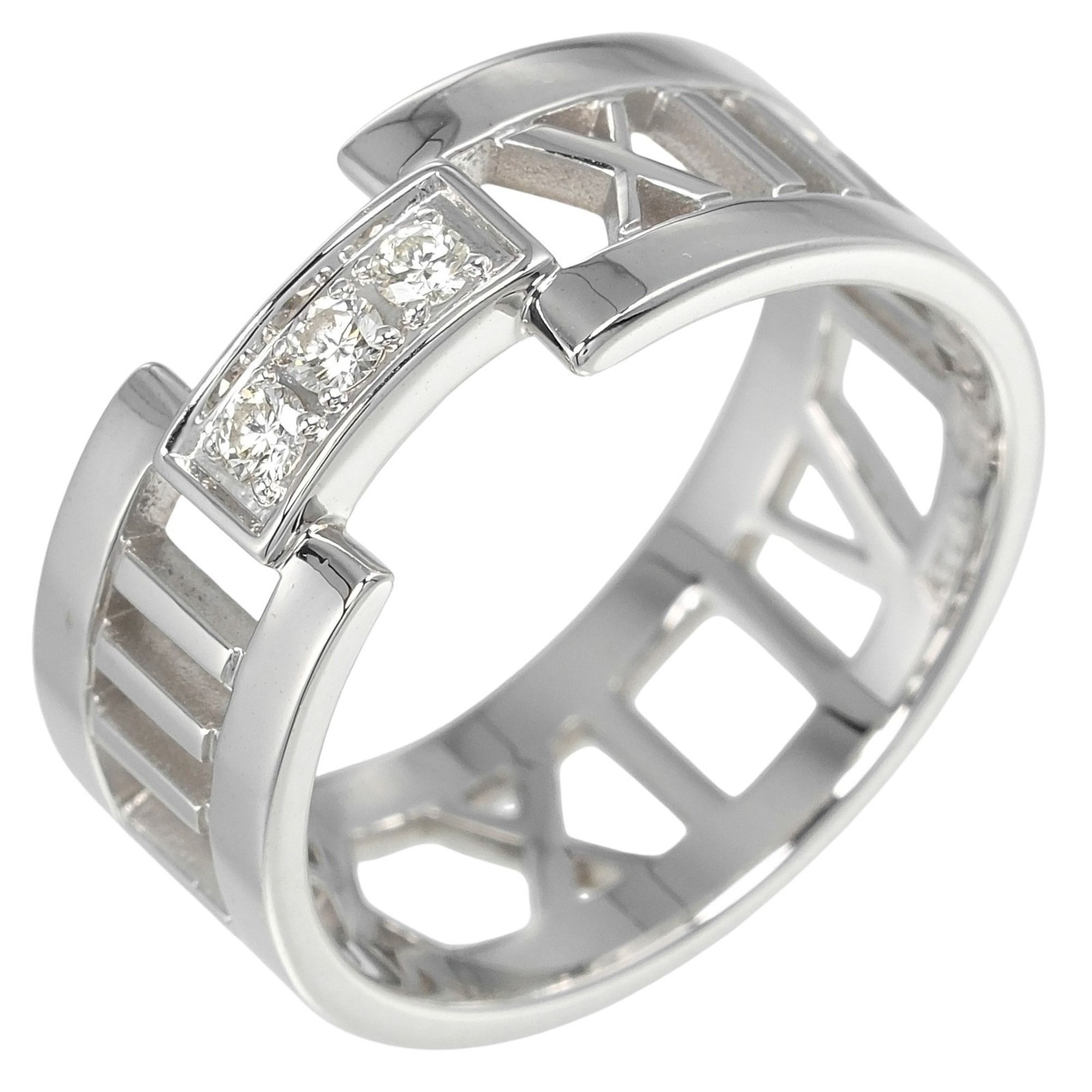 Tiffany & Co. Open Atlas Ring, size 17, 18K white gold with three diamonds, approximately 6.55g.