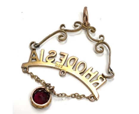 9ct gold vintage garnet set "rhodesia" ornate souvenir pendant (2.1g) 