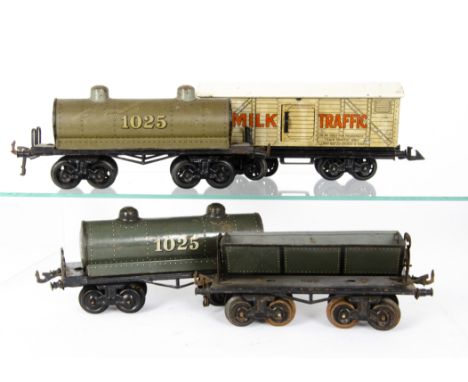 Vintage Bing 0 Gauge Bogie Freight Stock, two tank wagons no 1025, one in light grey with lead wheels, the other dark grey wi