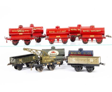Hornby O Gauge Tank Wagons and Other Freight Stock, tankers including two red 'Shell' on OAG bases, three red 'Royal Daylight