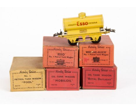 Boxed Hornby O Gauge Late Pre-War Tank Wagons,  blue 'Redline-Glico', buff 'Esso', red 'Royal Daylight' (box dated 2-39), gre