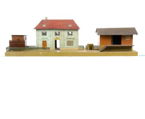 A Märklin O Gauge Station and Goods Shed Combination, with English legends 'Cloak-room' and 'Refreshments Room' to platform f