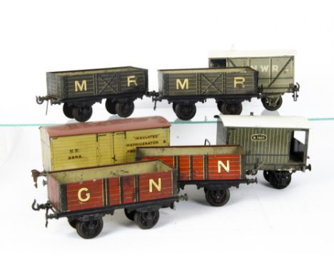 Early Tinplate Gauge 1 Freight Stock by Various Makers, Bing open wagons in MR grey (2) and GN red (2), a Märklin insulated r