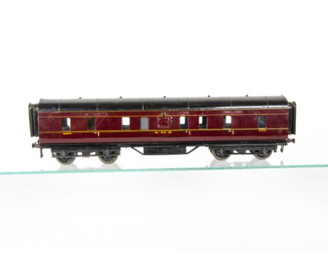 An Exley 0 Gauge LMS Main Line 50' Corridor Full Brake Coach, an older example in LMS crimson with hand-painted yellow/red le