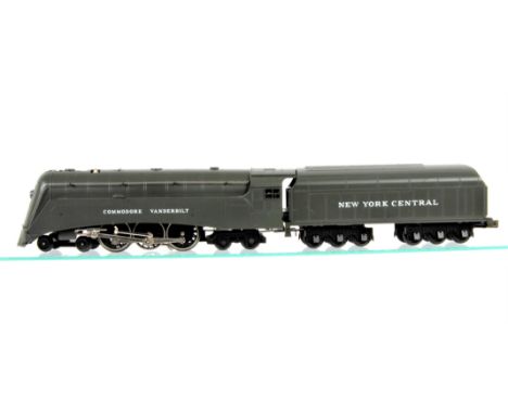An American 0 Gauge 3-rail electric NYC Hudson 4-6-4 Locomotive and Tender by MTH, unboxed, finished in NYC grey livery as 'C
