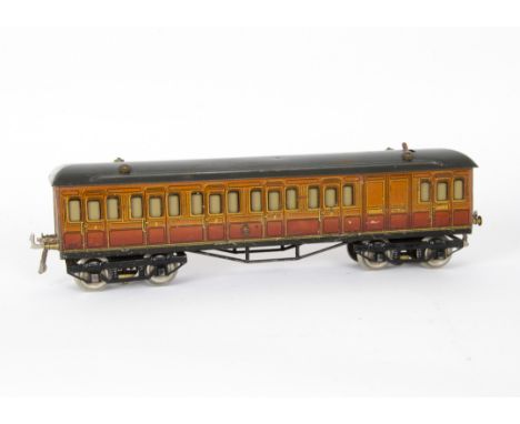 A Hornby O Gauge Illuminated Metropolitan Railway Brake/3rd Coach, in lithographed MR livery, with nickelled wheels and coupl