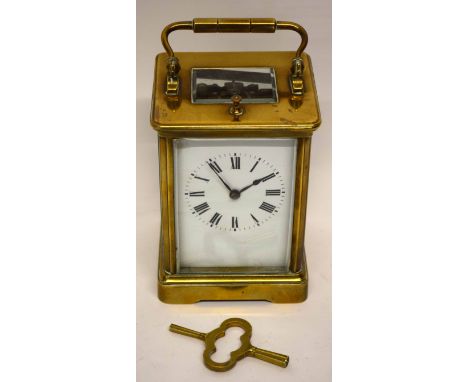 Good quality brass and glass cased Carriage Clock