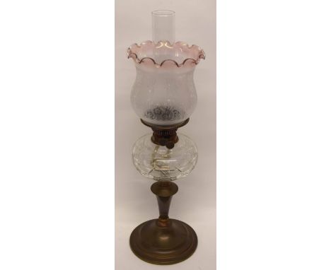 Brass oil lamp with glass reservoir and shade