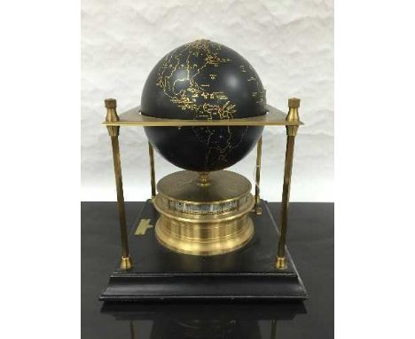 A Royal Geographical Society World Clock, 1980, the brass-cased movement with dial rotating on a horizontal plane with a blac