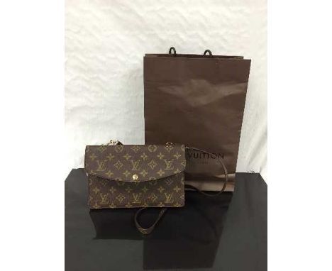 Louis Vuitton : A lady's hand bag, monogram canvas, with press-stud flaps to both sides, with monogrammed canvas shoulder str