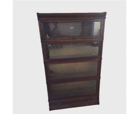 A Globe Wernicke four tier oak stacking bookcase, width 86 cm.