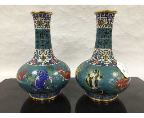 A pair of Chinese gilt bronze cloisonne vases, decorated with fish and crustaceans, signed to the base, height 26.5 cm. (2)  