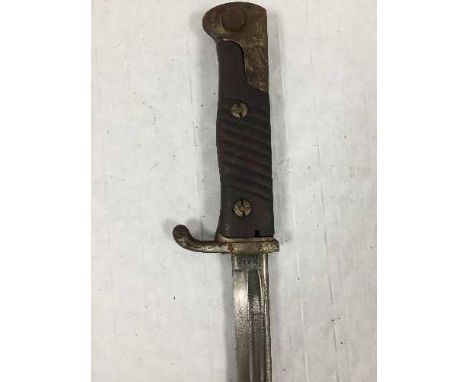 A German model 1898 Mauser rifle bayonet, pipe-backed 52cm blade by WK & C of Solingen, steel mounted leather scabbard. CONDI