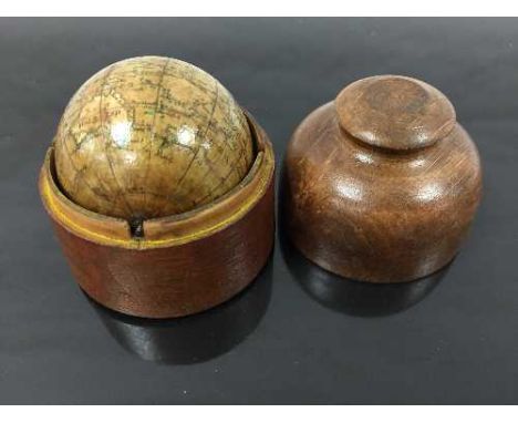 An early nineteenth century 2 inch pocket globe by Newton, the hand finished gorse panels with inscription 'Newtons New Terre