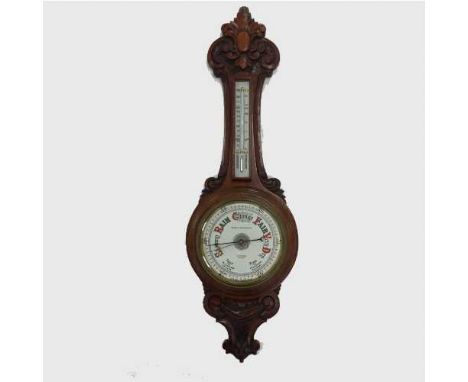 A nineteenth century carved oak aneroid wheel barometer, by Horne and Thornethwaite, 416 Strand, London, 92cm.