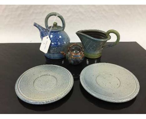 Jane Hamlyn (born 1940): A salt glazed small teapot, in blue glaze, spiral decoration, rope-twist handle, impressed 'JH' sign