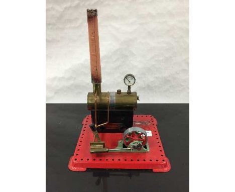 A Mamod stationary steam live engine, on tin base. 