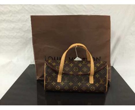Louis Vuitton : A lady's hand bag, monogram canvas,  with tan trim, with press-stud single flap top, with carry handles, with