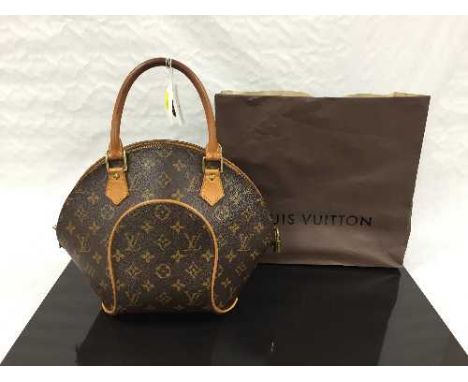 Louis Vuitton : A lady's Ellipse hand bag, monogram canvas with tan trim, zip top, with carry handle, with two keys, width at