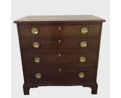 A George III mahogany four drawer chest on bracket feet, with ivory escutcheons and  brass circular handles, width 92 cm.