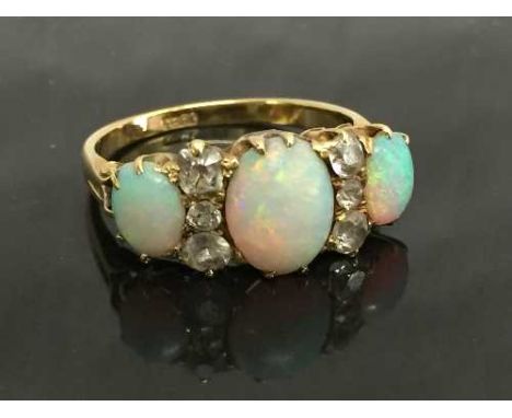 An 18ct gold opal and diamond ring, size O.