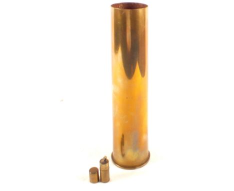 A WWII 6lb shell case (originally a blank) with a brass lighter