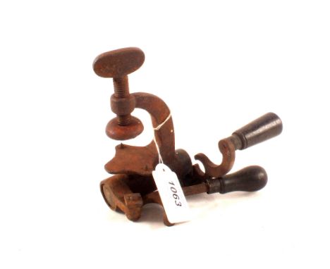 A vintage shotgun cartridge re-loading tool
