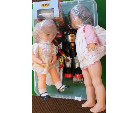 A robot plus other toys and dolls
