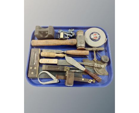 A tray of vintage hand tools including Thor Hammer company hammer, miniature vice, chisel, draftsman's tools, Rabone tape mea