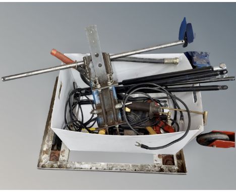 A metal trolley together with a box of further tools including winch etc.