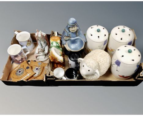 Two boxes containing Tang style pottery horse, a set of three pottery storage jars, two wooden shield crests, a Lladro figure