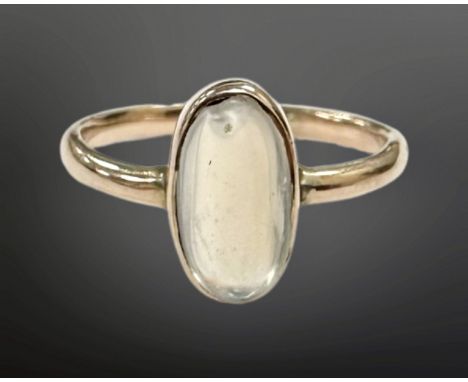 A rose gold moonstone ring, stone 10mm by 5mm, size L.  CONDITION REPORT: 2.1g